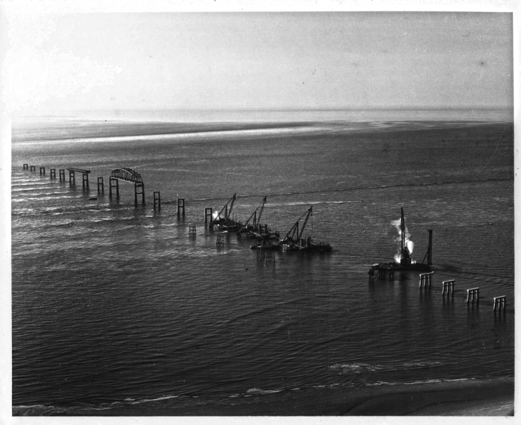 Construction of a portion of the trestle section spanning Fisherman Island toward North Channel Bridge: late 1962/early 1963. This is the tallest portion of the facility and traverses some of the deepest waters. Photo courtesy of the Chesapeake Bay Bridge Tunnel.