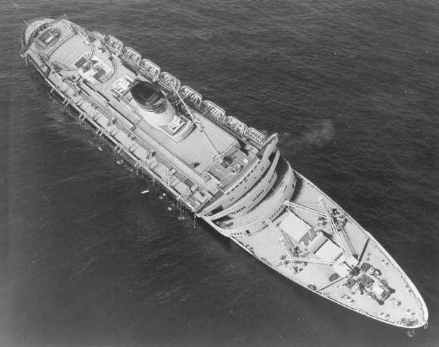 The Andrea Doria shortly before capsizing and sinking. A sever list developed after the ship was struck by the MS Stockholm. Photo courtesy USCG