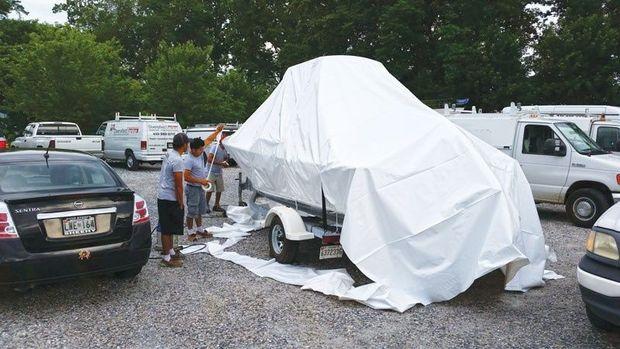 Shrink wrapping in progress. Photo by Diversified Marine Services/ dmsinc.net
