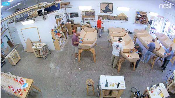 Student builders complete their dinghy kits under the watchful eye of their instructor in the shop at Chesapeake Light Craft in Annapolis, MD.