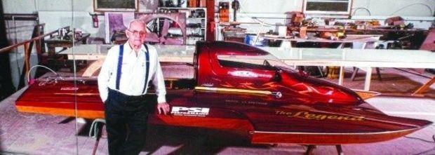 Henry Lauterbach with one of the hydroplane race boats he built.