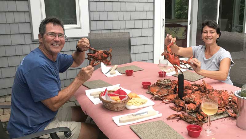 Loopers Bill and Kellirae Adcock enjoy crabs in Solomons Island.