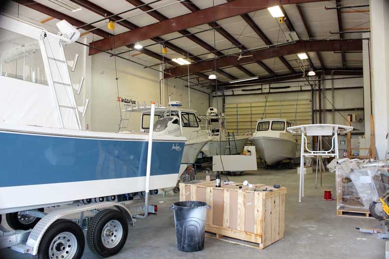 Three Judge 27 Chesapeakes and a 265 center console being completed at Judge Yachts in Denton, MD. Photo by Rick Franke