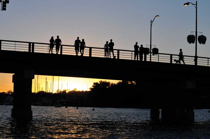 Walk over the Eastport Bridge at sunset for one of the best photo opportunities in town. Photo by Al Schreitmueller