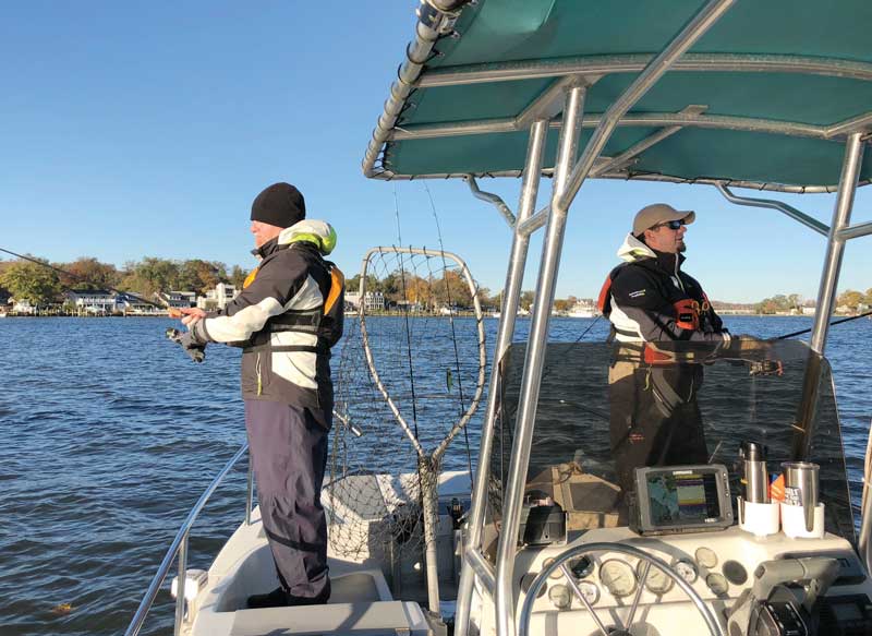 PropTalk staffers Chris Charbonneau and Zach Ditmars wearing vest-style PFDs during the Fish for a Cure tournament in November.