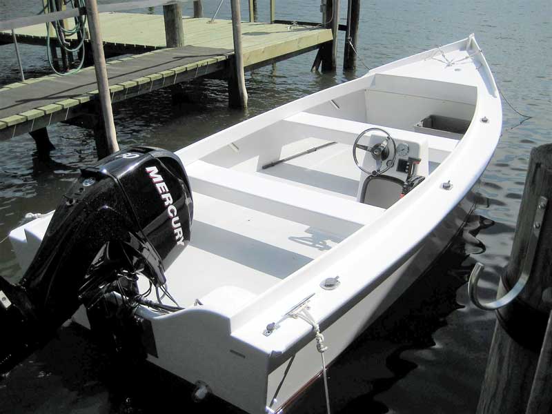 A Rionholt Boats 20-foot trap skiff reproduction built entirely of PVC plastic built at Rionholt Once and Future Boats in Gwynn’s Island, VA. 