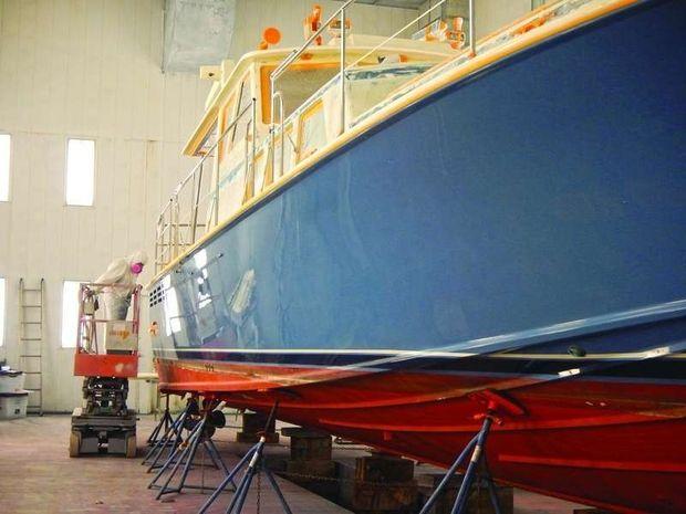 A Dettling 51 receiving a complete refinishing in the paint shop at Hartge Yacht Harbor in Galesville, MD.
