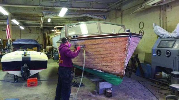 A classic Chris-Craft Sea Skiff and a 1985 Donzi undergoing restoration at Classic Restoration and Supply in Philadelphia, PA.