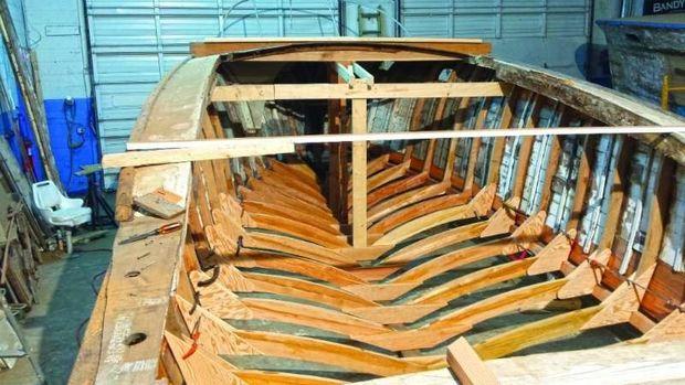 New bottom frames being installed as part of the restoration of 1955 Rybovitch hull number18 at Casa Rio Marina in Mayo, MD.