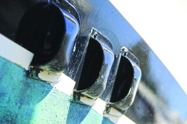 While they may impede flow to some extent, installing clamshell covers over discharge ports will reduce the likelihood of back-flooding. While they may impede flow to some extent, installing clamshell covers over discharge ports will reduce the likelihood of back-flooding.