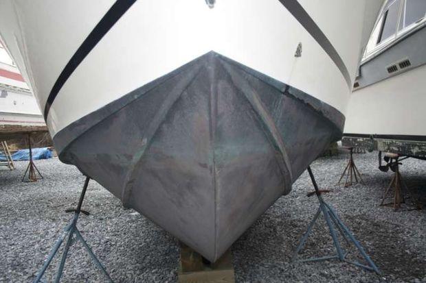 The sharp entry of the deep vee hull on a Carolina Classic