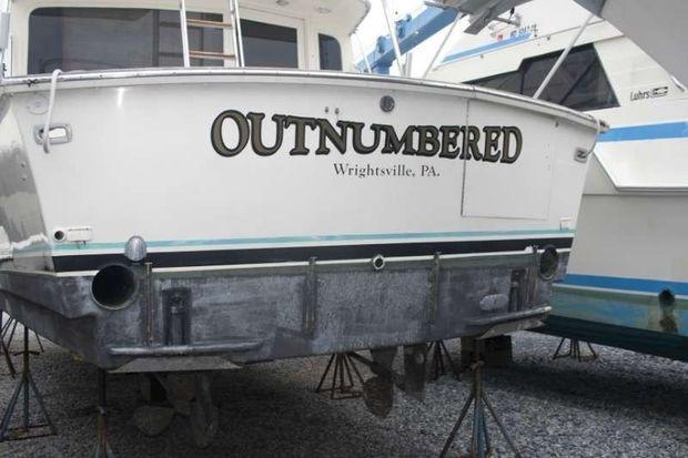 A flat bottom on a larger boat.