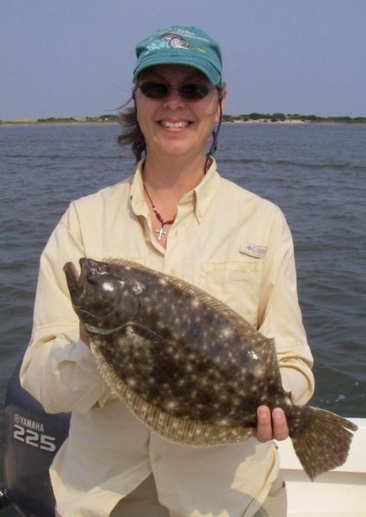 This happy angler caught a keeper flounder off Ocean City with Captain Lew. (Photo courtesy of Lew's Fly Angler) This happy angler caught a keeper flounder off Ocean City with Captain Lew. (Photo courtesy of Lew's Fly Angler)