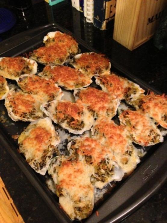 Oysters Rockefeller. The original recipe does not call for Parmesan cheese, but PropTalk thinks it should. Photo by Gary Reich