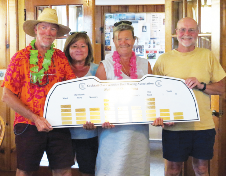 (L to R) Kim Granbery, Nancy Bluefeld, Gretchen Granbery, and Curt Bluefeld at the 2014 Nationals in Rock Hall. Jack Pettigrew created the boat transom winner's plaque.