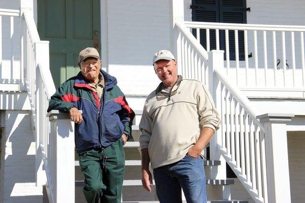 Bob Kopel (left) with Mike Hutson on the steps of Blackistone Lighthouse.