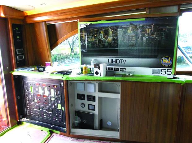 The electrical panel and entertainment center nearing completion on Maximus, a Weaver 70 at Weaver Boat Works in Tracys Landing.