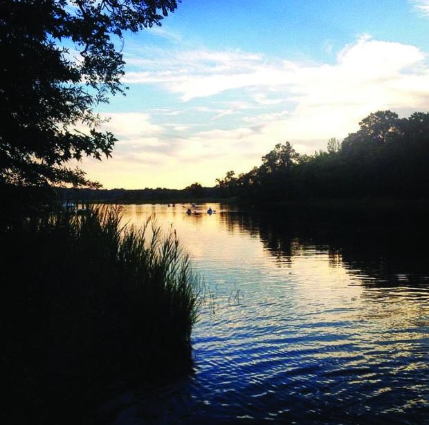 Paddlers at dusk on Dundee Creek.