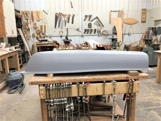 The first of 75 five-foot miniature sailboat hulls being produced by Mathews Brothers in Denton, MD, for Educational Passages, an oceanic research project at Washington College.