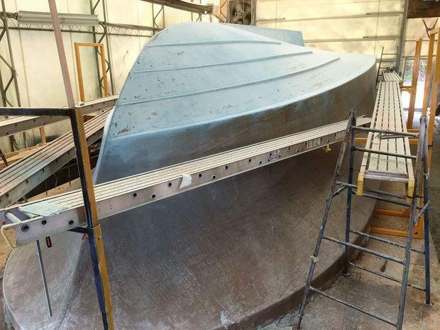 A new Composite Yacht 46, out of the mold and being faired at the Composite Yacht shop in Trappe, MD.