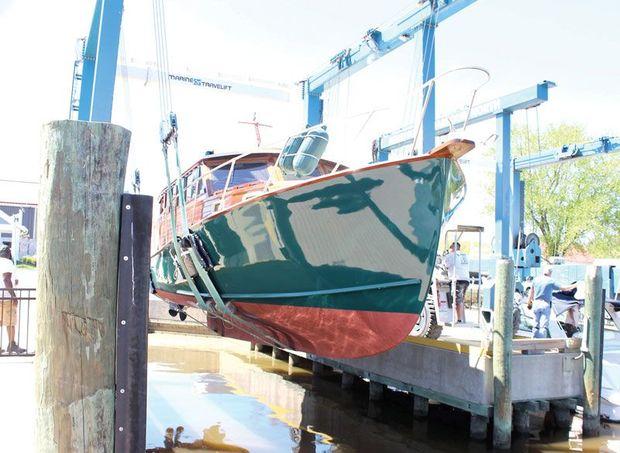 YOLO, a 1967 Bruno and Stillman lobster boat converted to a yacht about to be launched after a four-year rebuild at Herrington Harbour North in Tracys Landing, MD. Photo by Rick Franke
