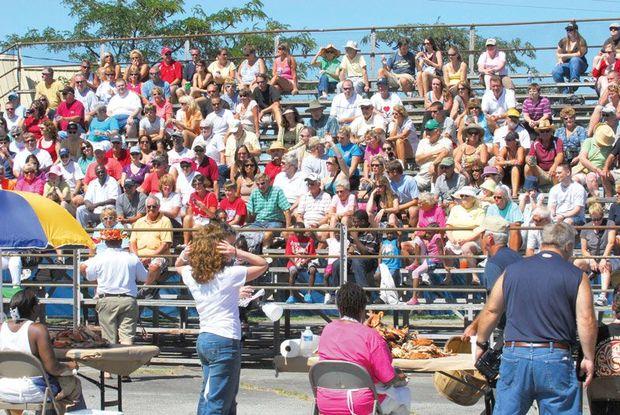 Featured events include the Miss Crustacean Pageant, a boat docking competition, 10K race/walk, and crab cooking contest.