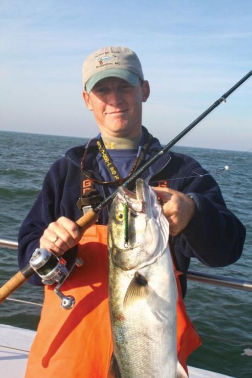This was a head boat trip for tog, but when the big blues showed up, my son Ric was ready to change rigs and use a metal jig. This was a head boat trip for tog, but when the big blues showed up, my son Ric was ready to change rigs and use a metal jig.