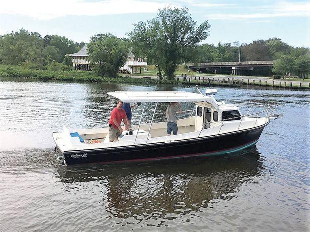 A newly delivered Robbins 29 departs Mathews Landing in Denton, MD, for home.