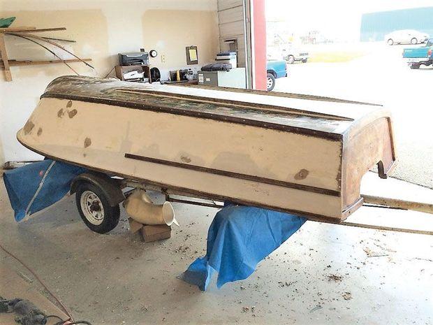 A late 1950s plywood Trojan Sea Queen in for bottom repairs and a new fiberglass bottom at Choptank Boat Works In Denton, MD.