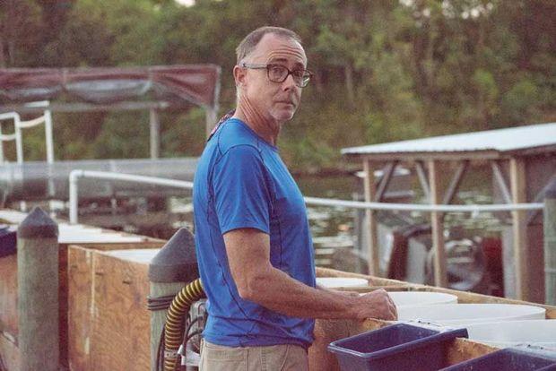 Tal Petty's favorite part of the business is being by the water, tending to his oysters.