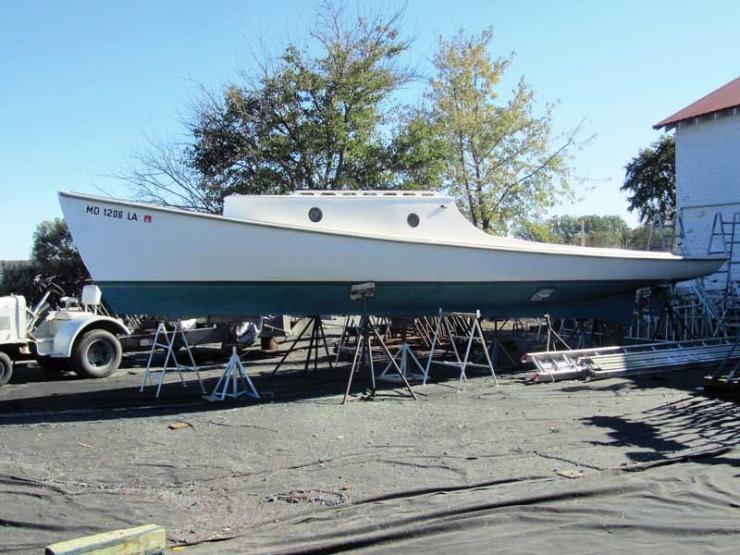 Onaway, a rare round bottom, counter stern Chesapeake work boat built in 1921, in the yard for paint and minor winter work at Hartge Yacht Yard in Galesville, MD.