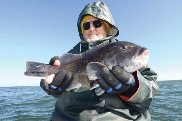 A pair of Glacier Gloves will keep your hands warm when fishing in cold weather.