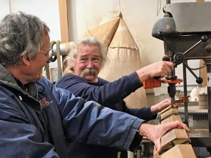 Carpenters Peter Bell (L) and Ernie Stuermer fabricating supports for the Seakeeper installation in Manatee at Hartge Yacht Yard in Galesville, MD.