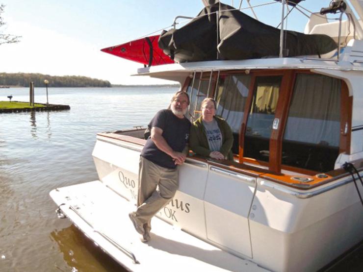 Foster and Susan on the back of the Quo Vadimus the day they left from Bohemia Bay Yacht Harbour.