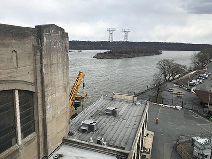 From the top of the dam looking south, shows the much cleaner waters of the Susquehanna River.