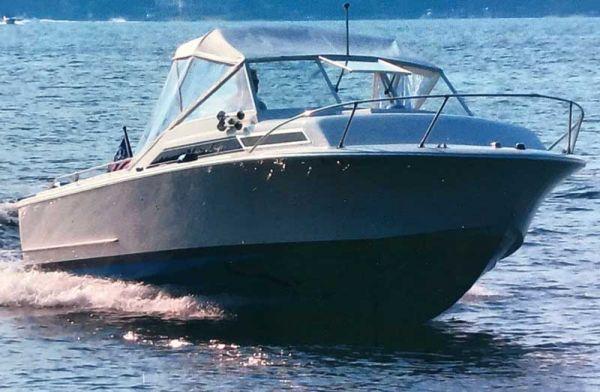 Cocktail Island is a 25-foot fiberglass Lancer Sportsman.