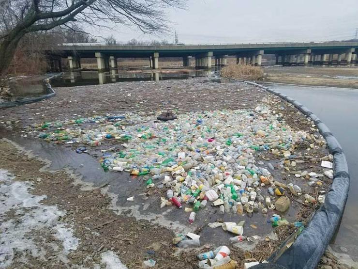 The trash boom was installed in 2010 in Back River and has removed three million pounds of trash to date.