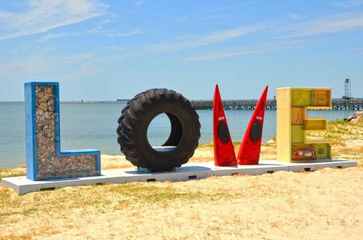 The LOVEwork is right next to the fishing pier and at one end of the Cape Charles public beach. Photos courtesy Eastern Shore Tourism Commisssion