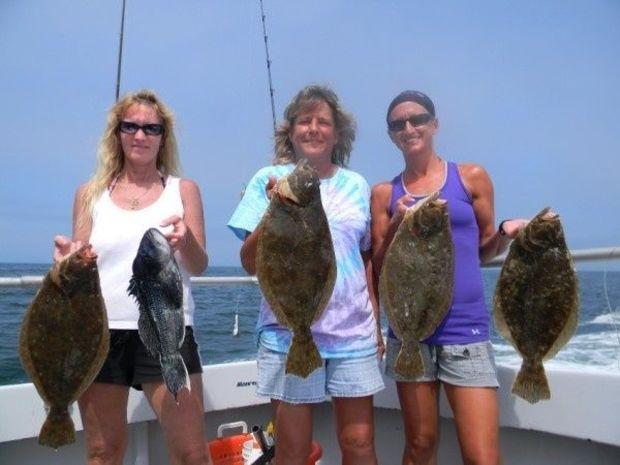 Jodi Deforno of Avonmore, PA , Tina Kinder, and Diane Walsh of Ocean City, MD, all caught keeper sea bass and summer flounder board Capt. Monty Hawkins Morning Star. Photo courtesy of Capt. Monty Hawkins