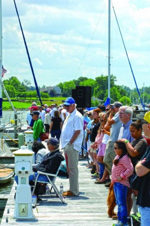 Spectators lined the dock at Urbana Town Marina.