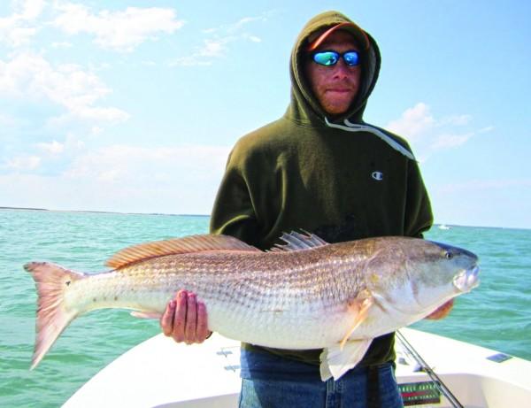 Rob McColligan with a bull red drum caught and released off Fisherman's Island, VA. Photo courtesy of Kevin Josenhans.