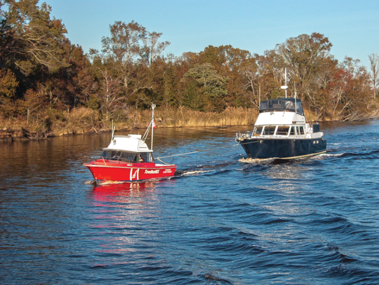 Boat under tow in Alligator-Pungo Rivers Canal.