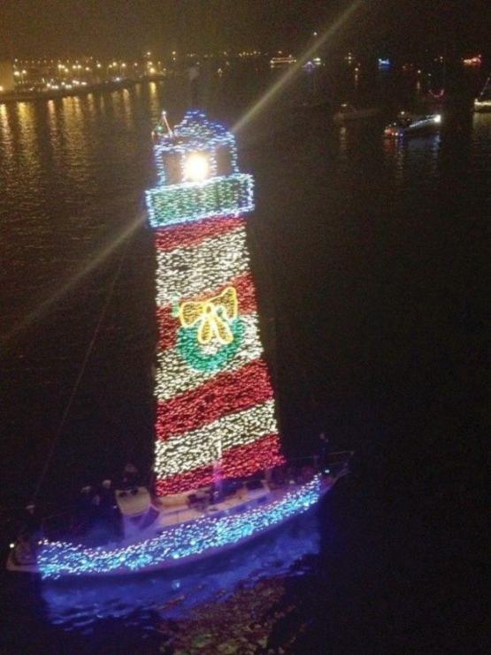 "Lighthouse Sally," skippered by John Yanik, won Best Illumination at EYC parade. "Lighthouse Sally," skippered by John Yanik, won Best Illumination at EYC parade.