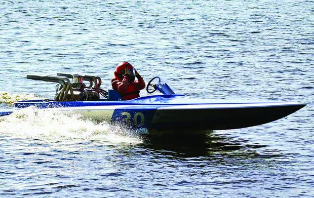 Racer Katelyn Shaw driving #30 ski boat class SE raceboat. facebook.com