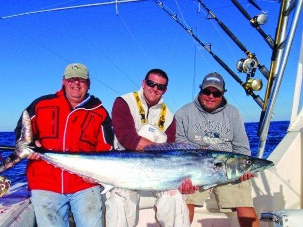 Stan Simmerman caught the largest wahoo in Virginia in 2014. Photo courtesy of Ken Neill III, <em>Healthy Grin</em>