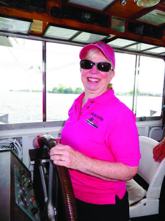 Capt. Judy Bixler at the helm of The Talbot.