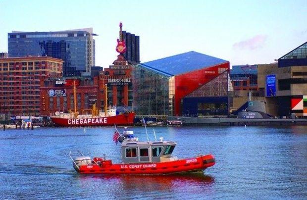 A U.S. Coast Guard 21-foot rescue boat patrols the Inner Harbor Baltimore. Photo by PA1 Tom Sperduto/ USCG A U.S. Coast Guard 21-foot rescue boat patrols the Inner Harbor Baltimore. Photo by PA1 Tom Sperduto/ USCG
