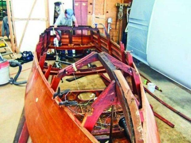 <em>Sly Fox</em>, a 15.5-foot 1938 Chris Craft Deluxe runabout undergoing restoration at Wooden Boat Restoration in Millington, MD.