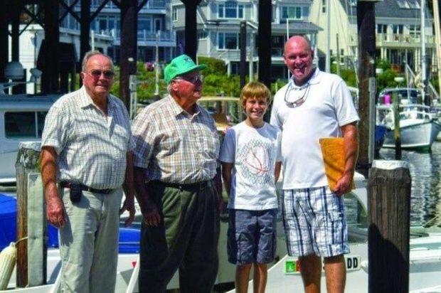 Easy Bell's original owner's son Dick Hutson, boat builder Creighton Palmer, Jared Hutson, and Mike Hutson on the docks before their boat ride. Easy Bell's original owner's son Dick Hutson, boat builder Creighton Palmer, Jared Hutson, and Mike Hutson on the docks before their boat ride.