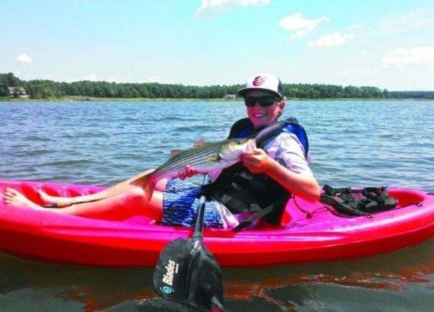 Edward Hart with his first rockfish taken from a kayak during CD Outdoors Kayak Fishing Camp. Photo courtesy of Capt. Chris D. Dollar Edward Hart with his first rockfish taken from a kayak during CD Outdoors Kayak Fishing Camp. Photo courtesy of Capt. Chris D. Dollar
